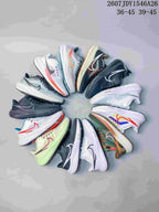 Group display showing multiple colorways of the Nike Air Zoom Pegasus 39 sneaker.