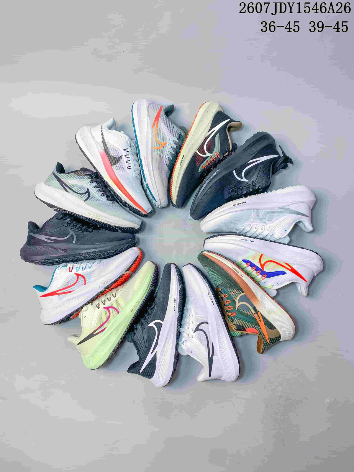 Group display showing multiple colorways of the Nike Air Zoom Pegasus 39 sneaker.