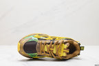 Top view of one sneaker showing the lace arrangement, padded collar, mesh toe area, and tongue branding.