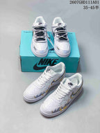 Two pictured pairs of white low-top sneakers with custom-style graphics and different lace arrangements