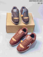 Two brown color variations of low-top sneakers displayed on a box.