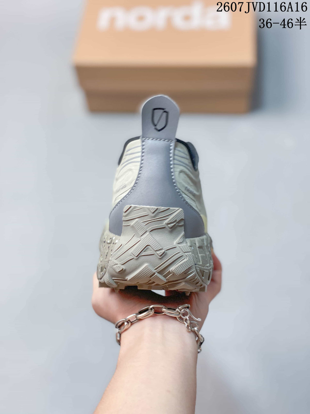 Rear view showing the padded-looking heel collar, heel pull tab, and textured outsole.