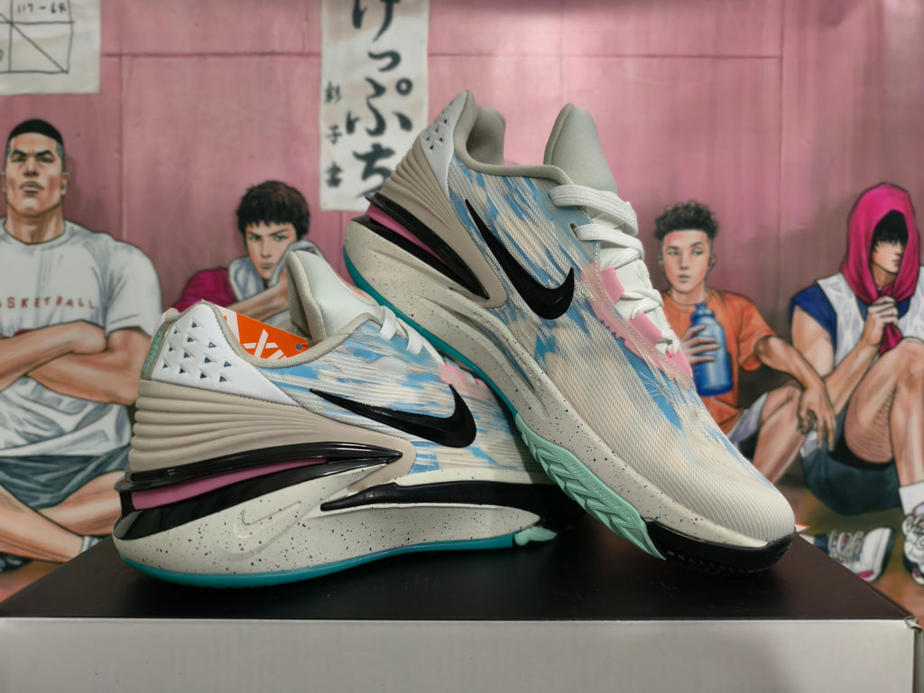 Pair of gray-blue Nike basketball shoes shown from the side and front.