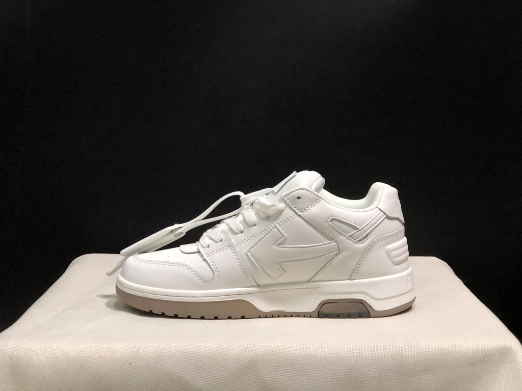 Side profile showing the low-top silhouette, layered side detailing and rubber outsole.