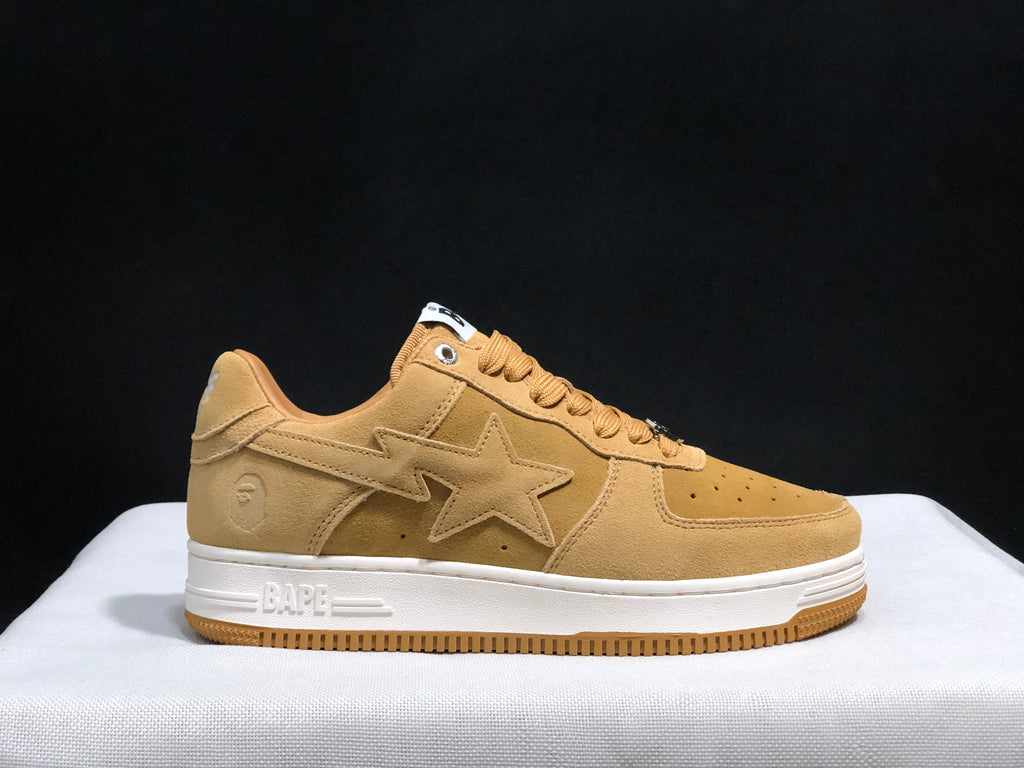 Opposite side profile showing the wheat upper, tonal star panel, BAPE midsole branding and gum outsole.