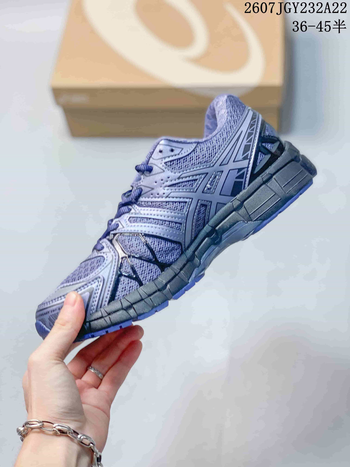 Side profile showing the low-cut silhouette, layered upper, and segmented midsole.
