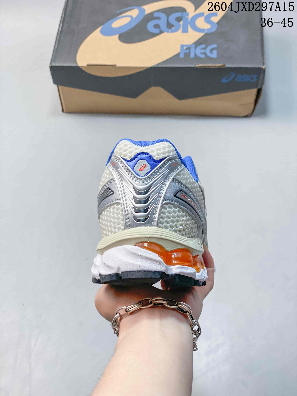 Rear view of a sneaker with textured light upper, silver heel details, blue trim, and orange midsole accents
