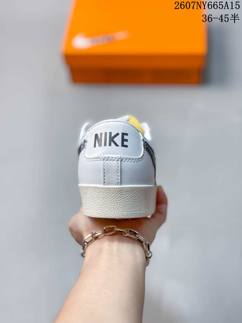Rear view showing the Nike branding on the heel tab and textured sole edge.