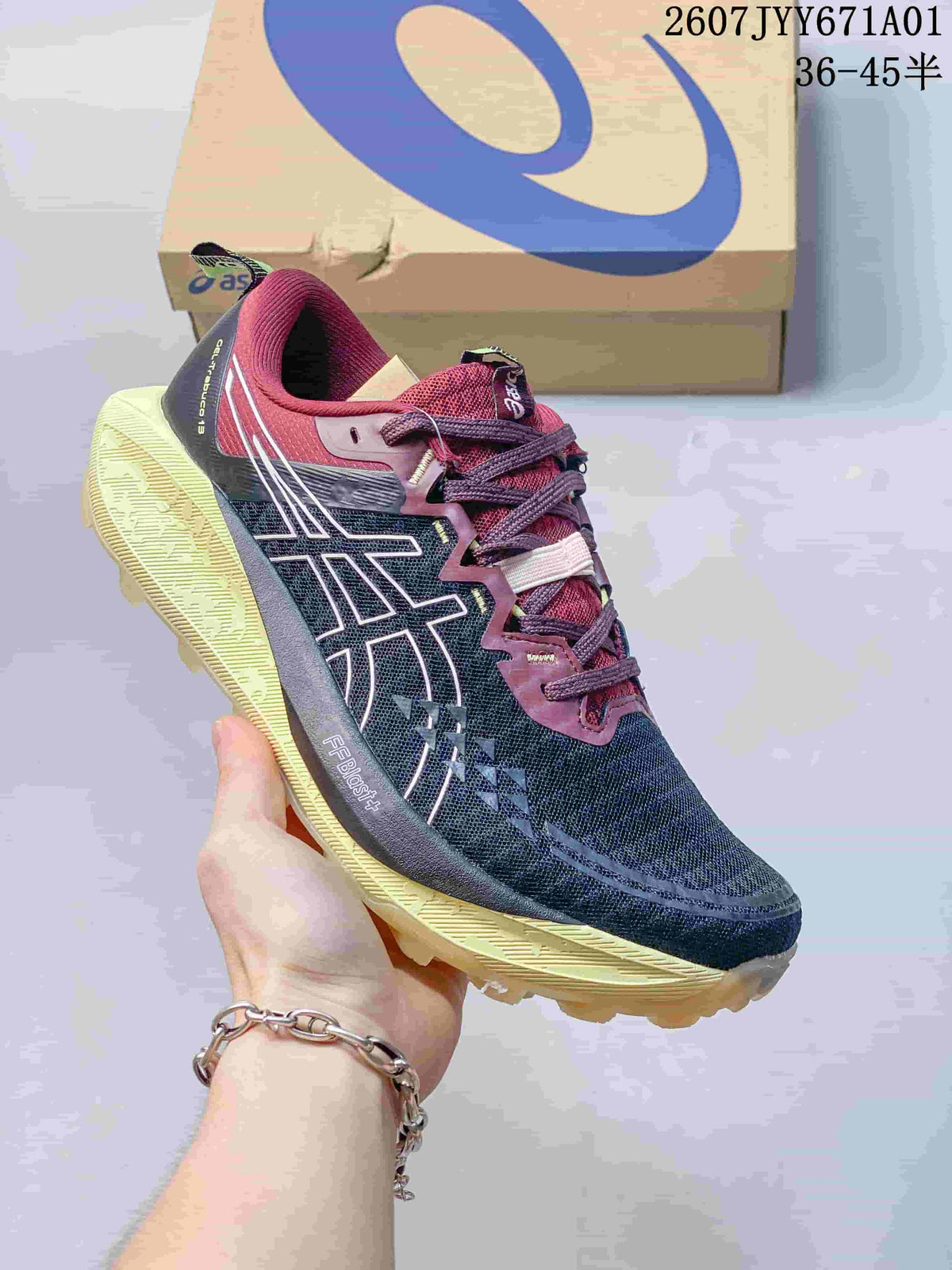 Navy ASICS GEL-TRABUCO 13 trail shoe with burgundy and pale yellow accents