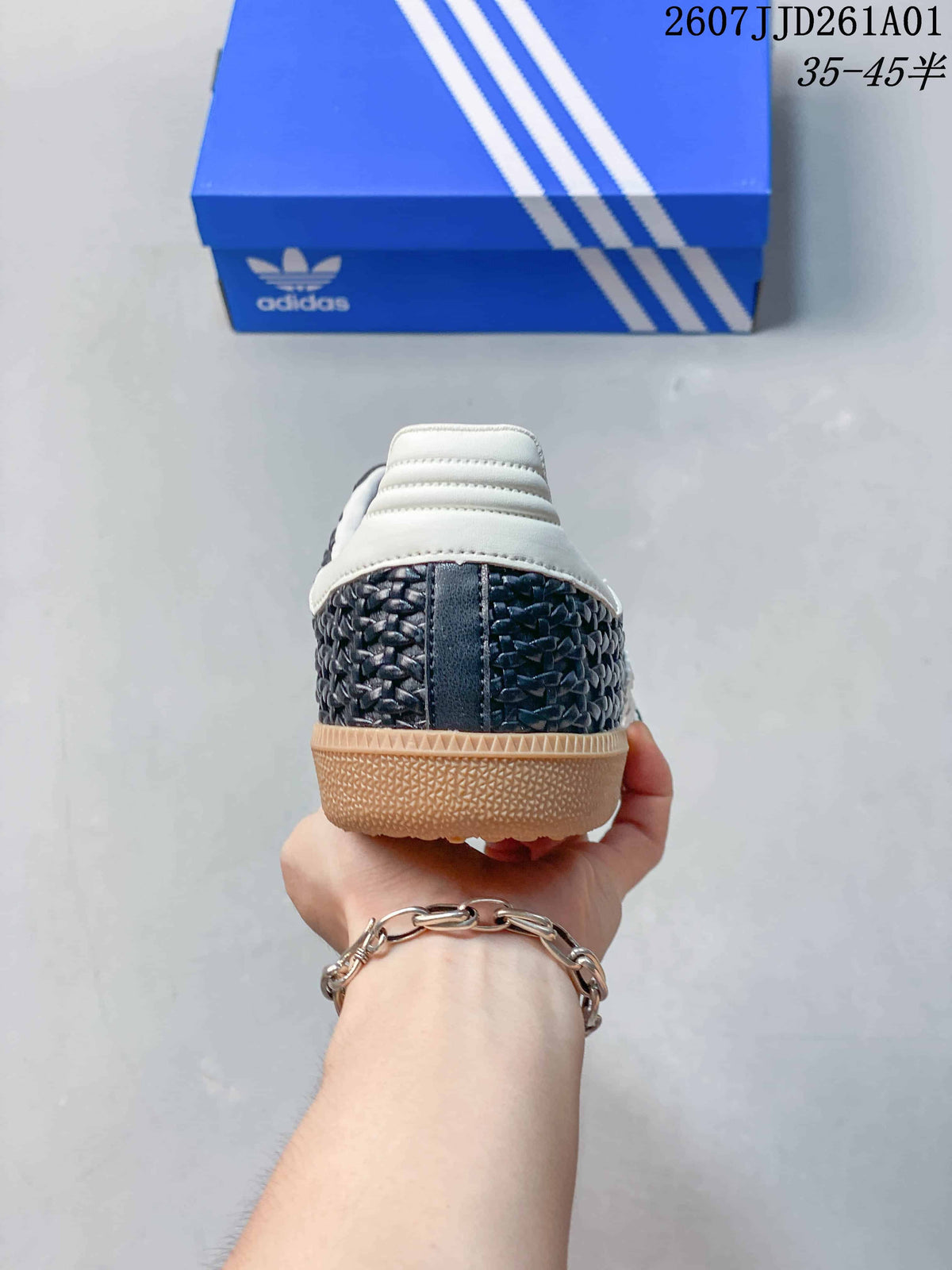 Rear view showing the woven-look heel and gum-colored outsole