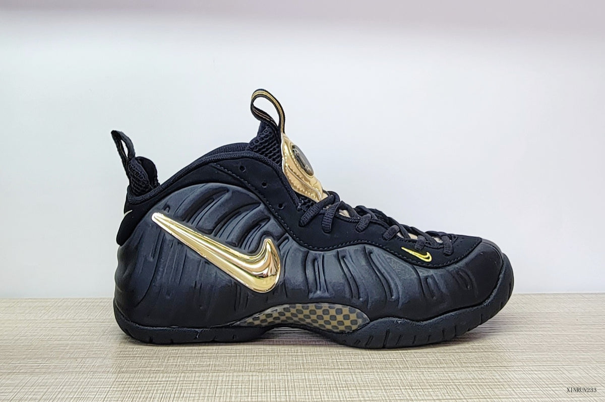 Side view highlighting the metallic gold Swoosh and patterned midsole detail