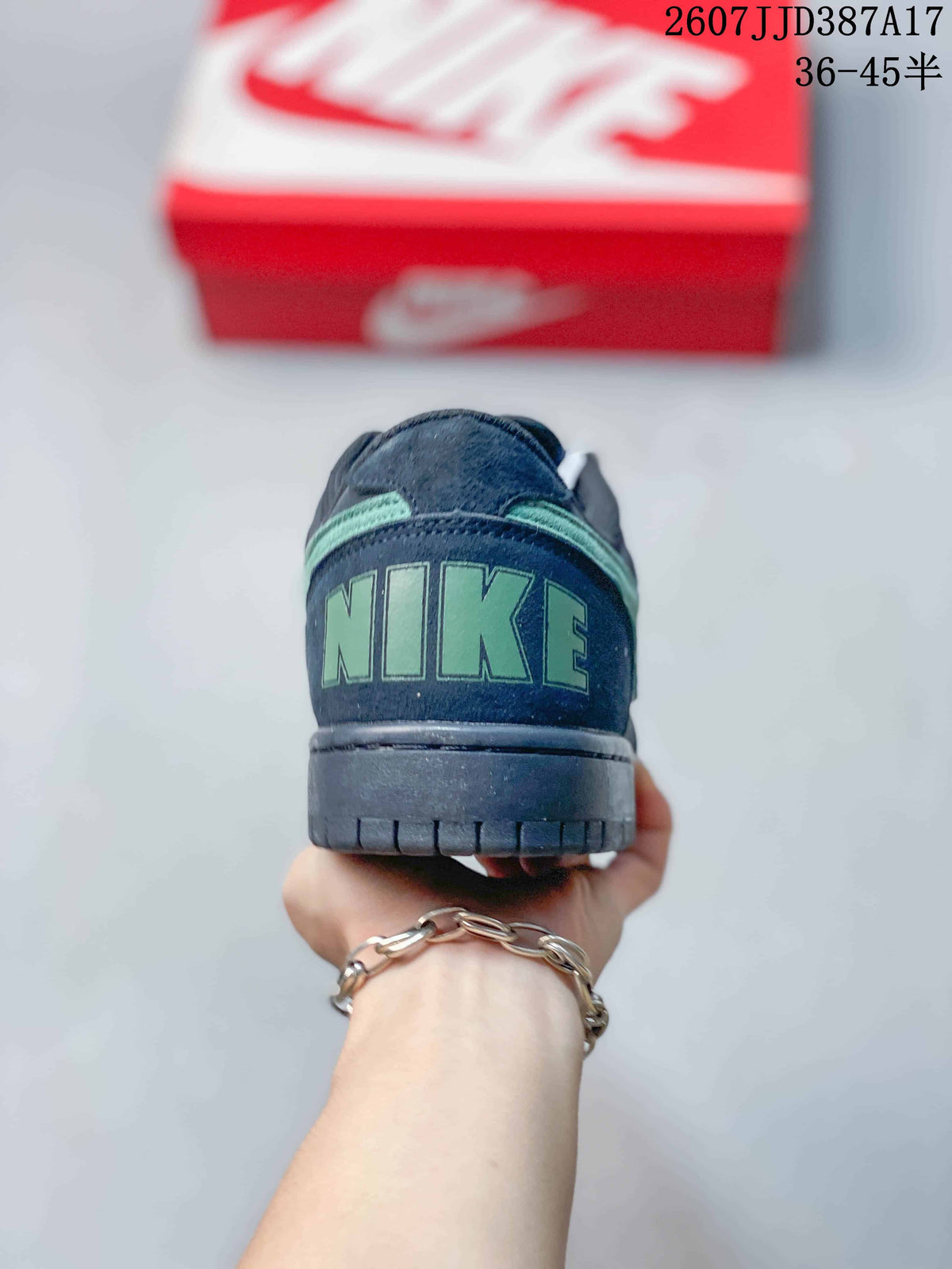 Rear view showing green Nike heel branding and the padded collar.