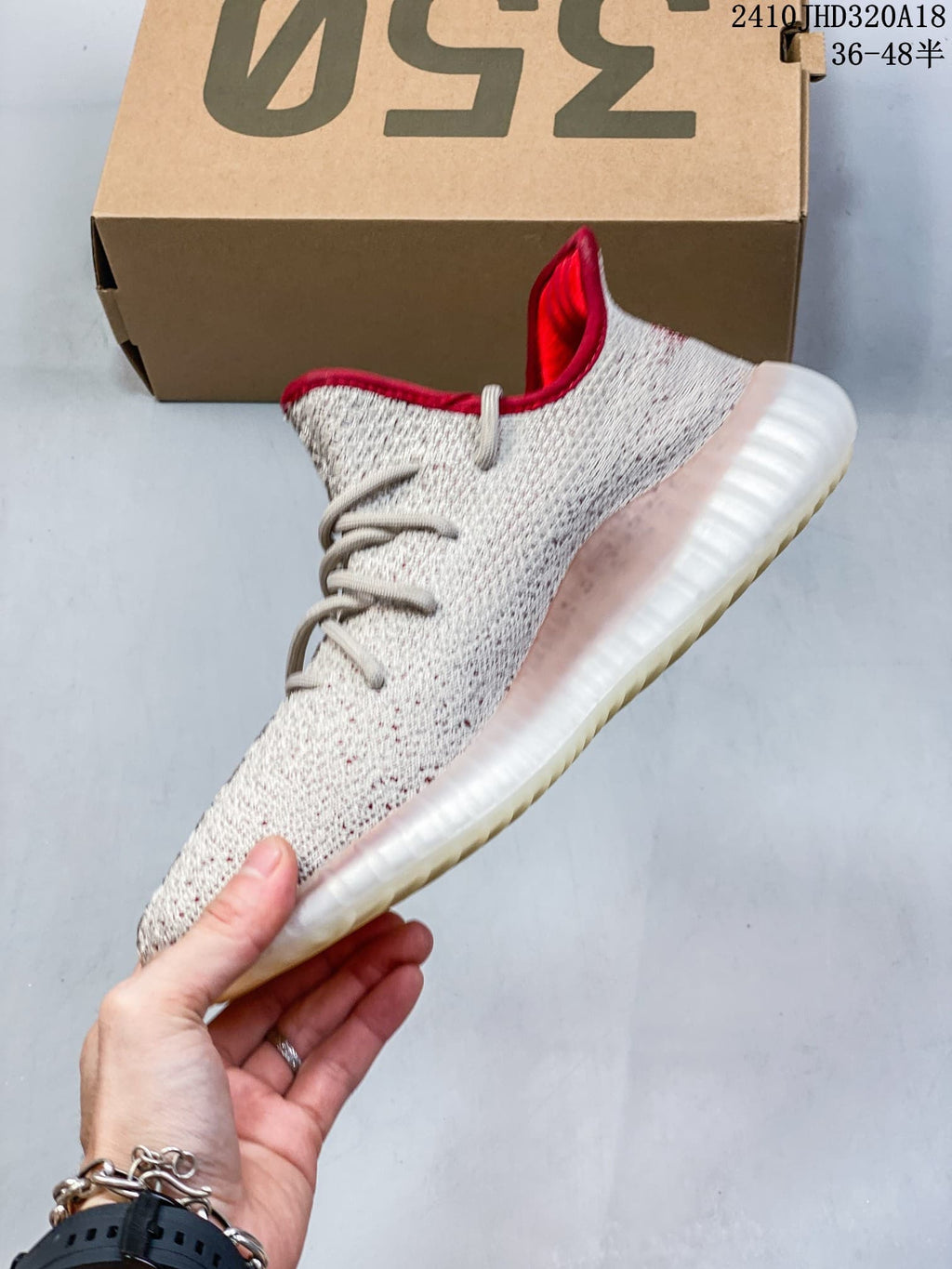 Side profile of the light knit sneaker with a translucent ribbed midsole and outsole.