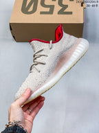 Side profile of the light knit sneaker with a translucent ribbed midsole and outsole.