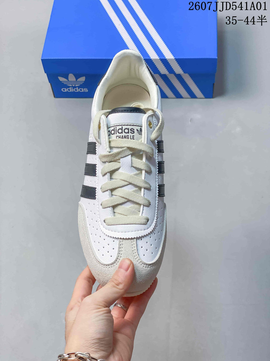Top view of the lace-up sneaker with perforated forefoot panels