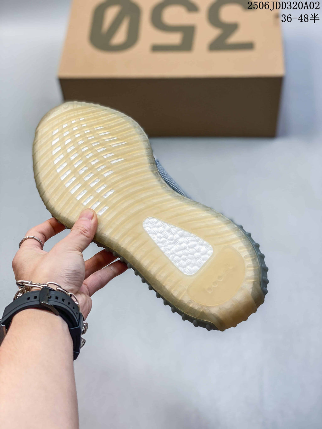 Underside of a sneaker showing the translucent outsole and central textured insert.