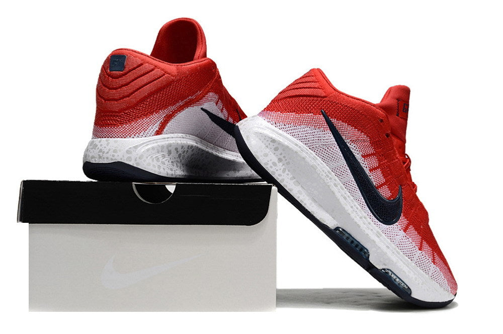 Red and white Nike GT Hustle 3 shoes displayed from the heel and side.