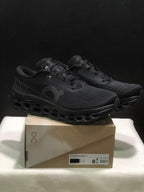 Black On Cloudmonster 3 sneakers displayed on their shoe box; the box label shows EU 41 and US 8.
