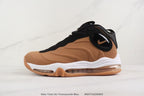 Side view of a brown Nike Total Air Foamposite Max sneaker with black details and a visible air unit