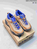 Pair of tan, blue, and black Nike ACG sneakers displayed on a shoebox; the image shows the source size range 39–45 and code 2607JYD233A23.