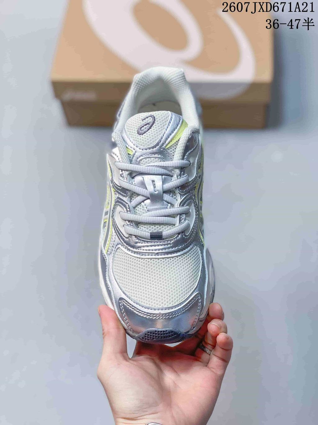 Top view of the sneaker showing the mesh toe box, laces, and tongue logo.