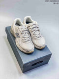 Pair of cream New Balance 740 sneakers displayed on a branded shoe box; the image also shows the text 36-45.