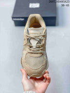 Top view showing the lace-up construction, tongue branding, and textured forefoot panels.