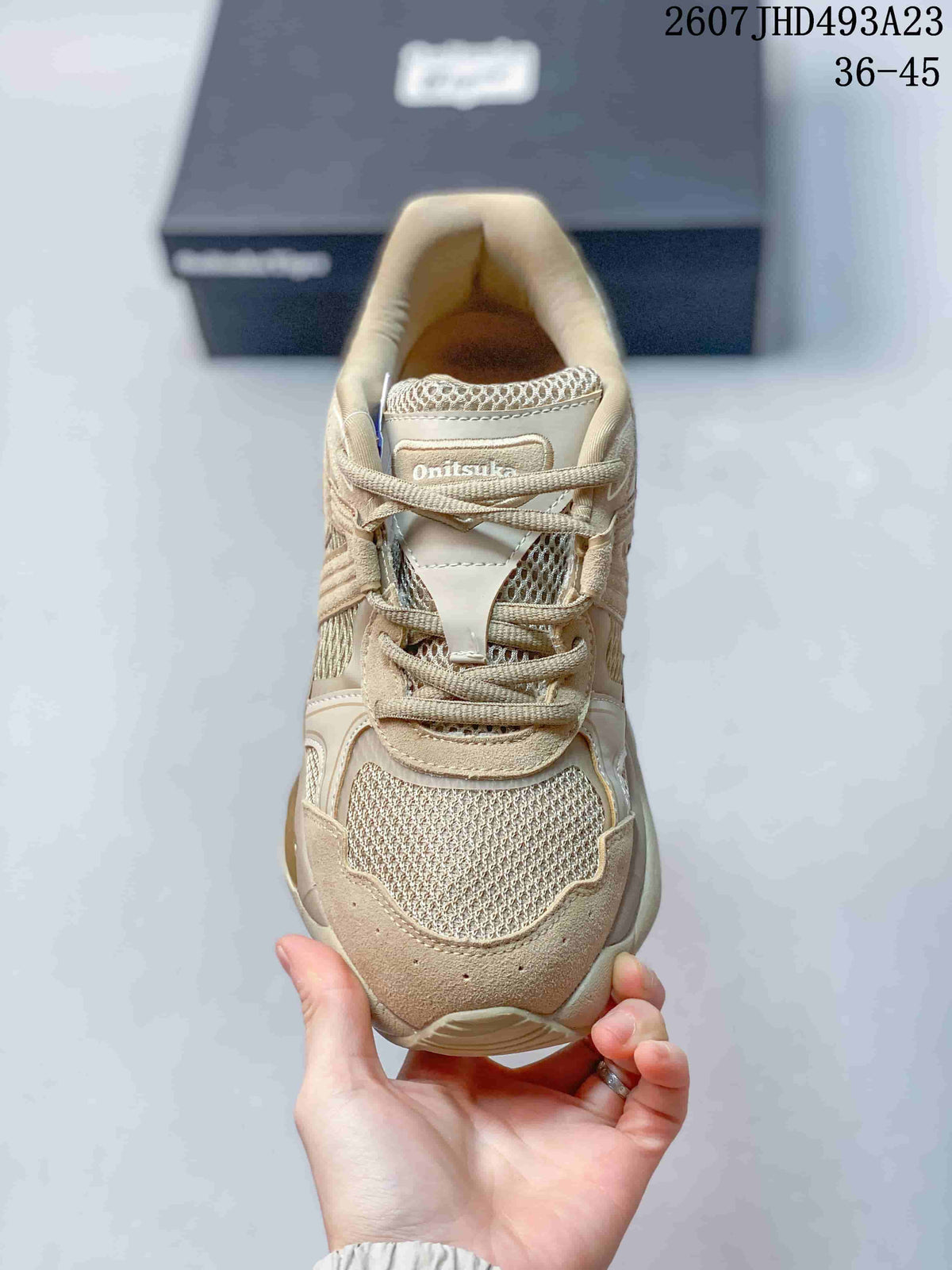 Top view showing the lace-up construction, tongue branding, and textured forefoot panels.