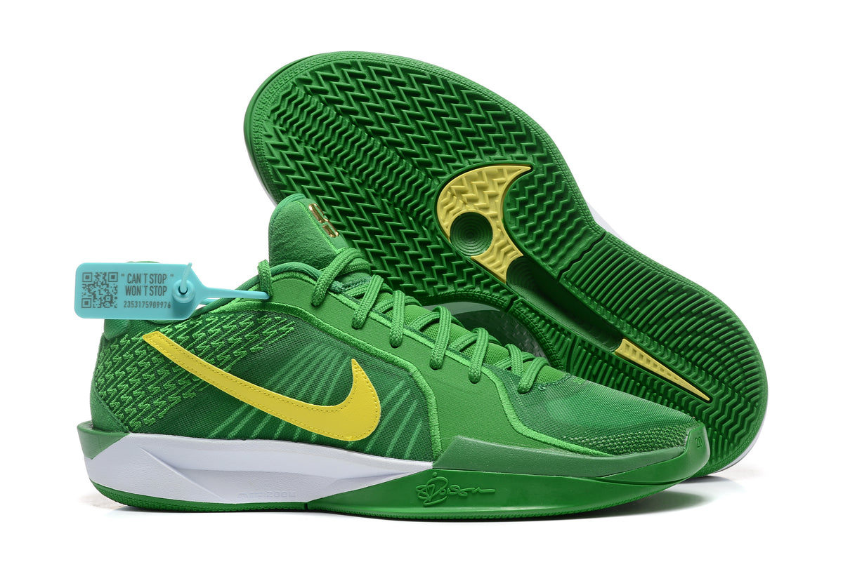 Green Nike Sabrina 2 shoes shown with the textured outsole visible.