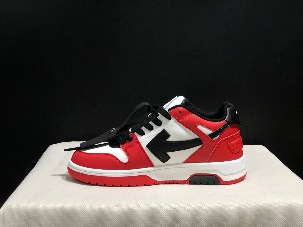 Lateral side profile showing the low-top silhouette, black arrow panel, red overlays, and white midsole.