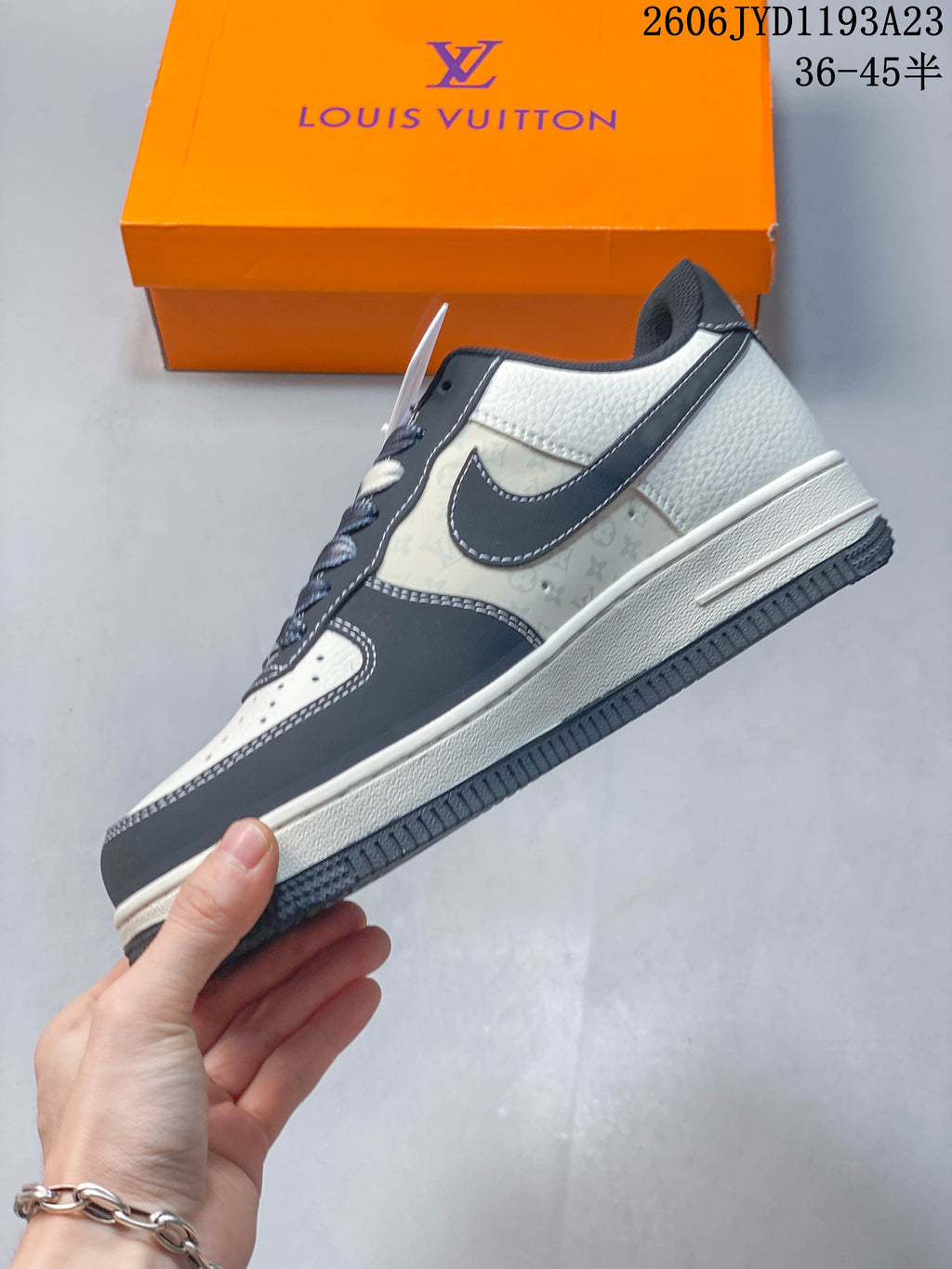 Side view showing patterned panels, dark overlays, and cream midsole
