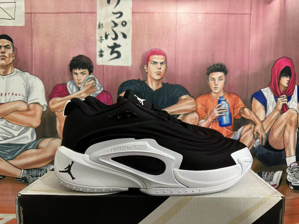 Side view of a black and white Jordan basketball shoe