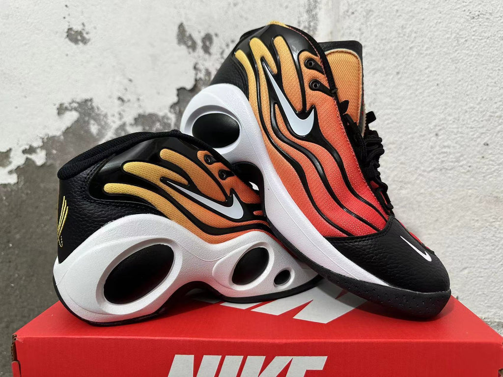 Nike Air Flightposite shoes displayed together, highlighting the gradient panels and sculpted soles