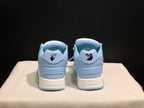 Rear view showing the contrasting heel details, printed graphics, and light blue outsole edges.
