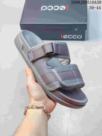 Angled view of a grey ECCO sandal with two adjustable straps