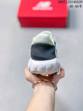 Rear view of a white New Balance sneaker showing the black padded heel collar, Fresh Foam heel branding and sculpted outsole; a red New Balance shoe box is in the background.