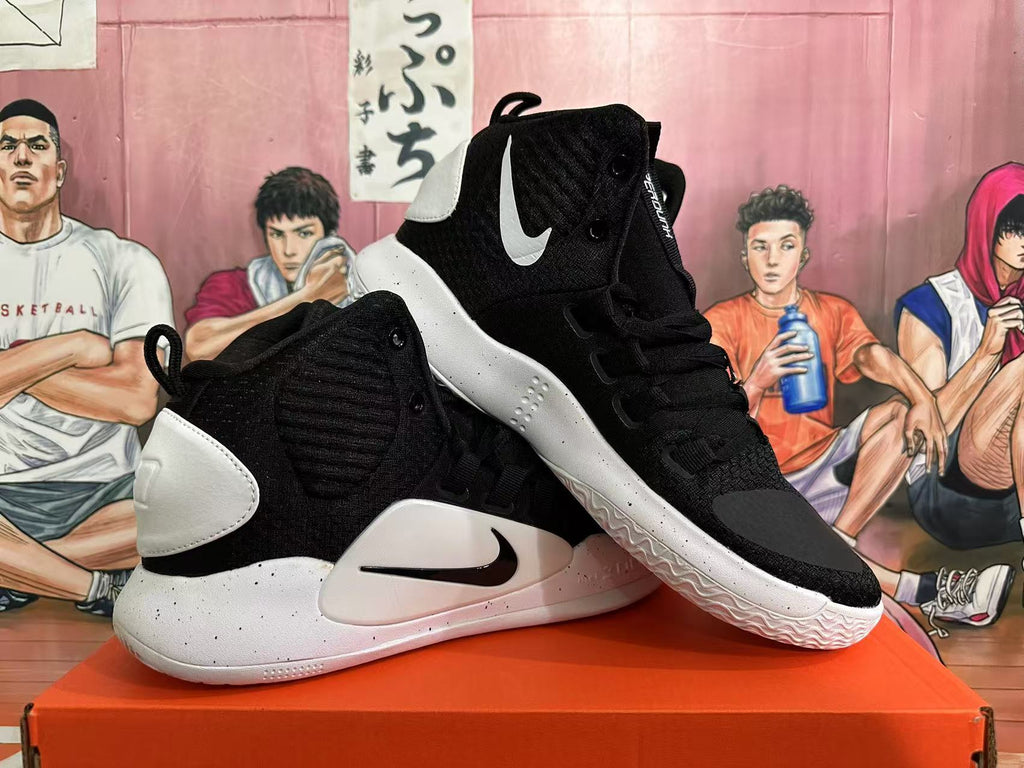 Angled view of the black and white high-top basketball shoes