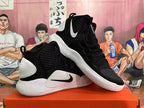 Angled view of the black and white high-top basketball shoes