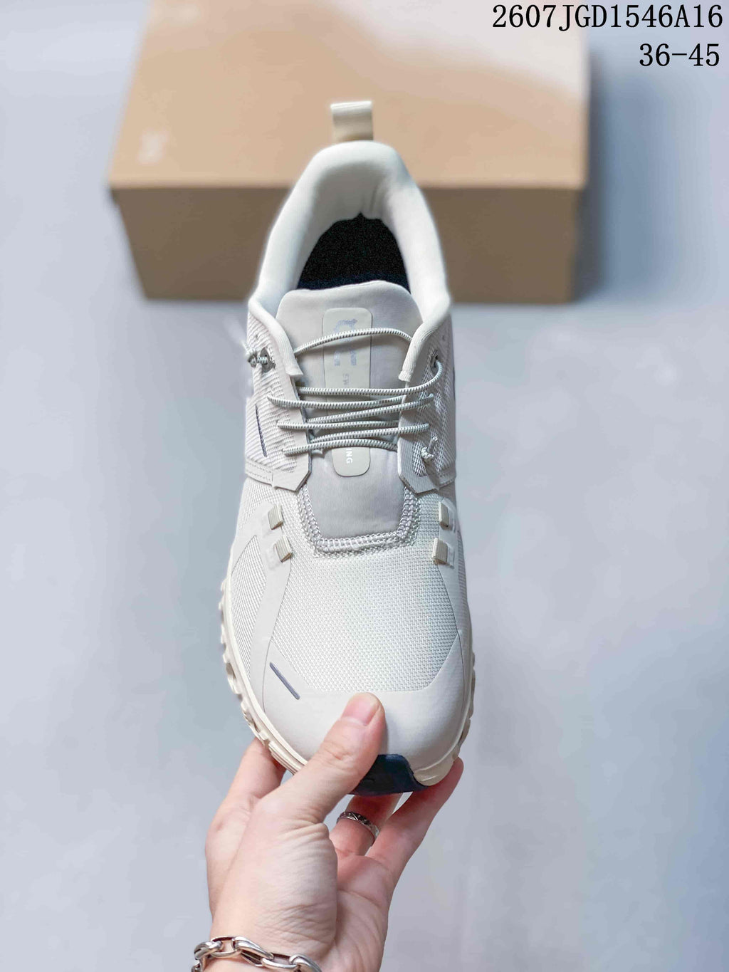 Top view of the sneaker showing the structured tongue, lace system and textured toe box.