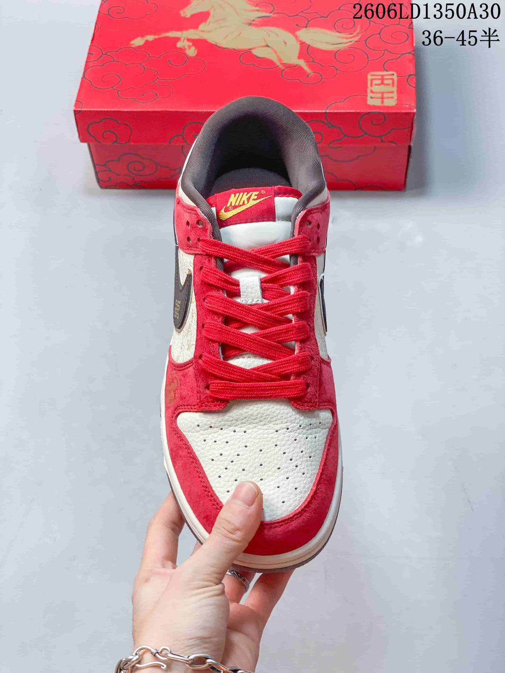 Top view showing the perforated cream toe and red laces