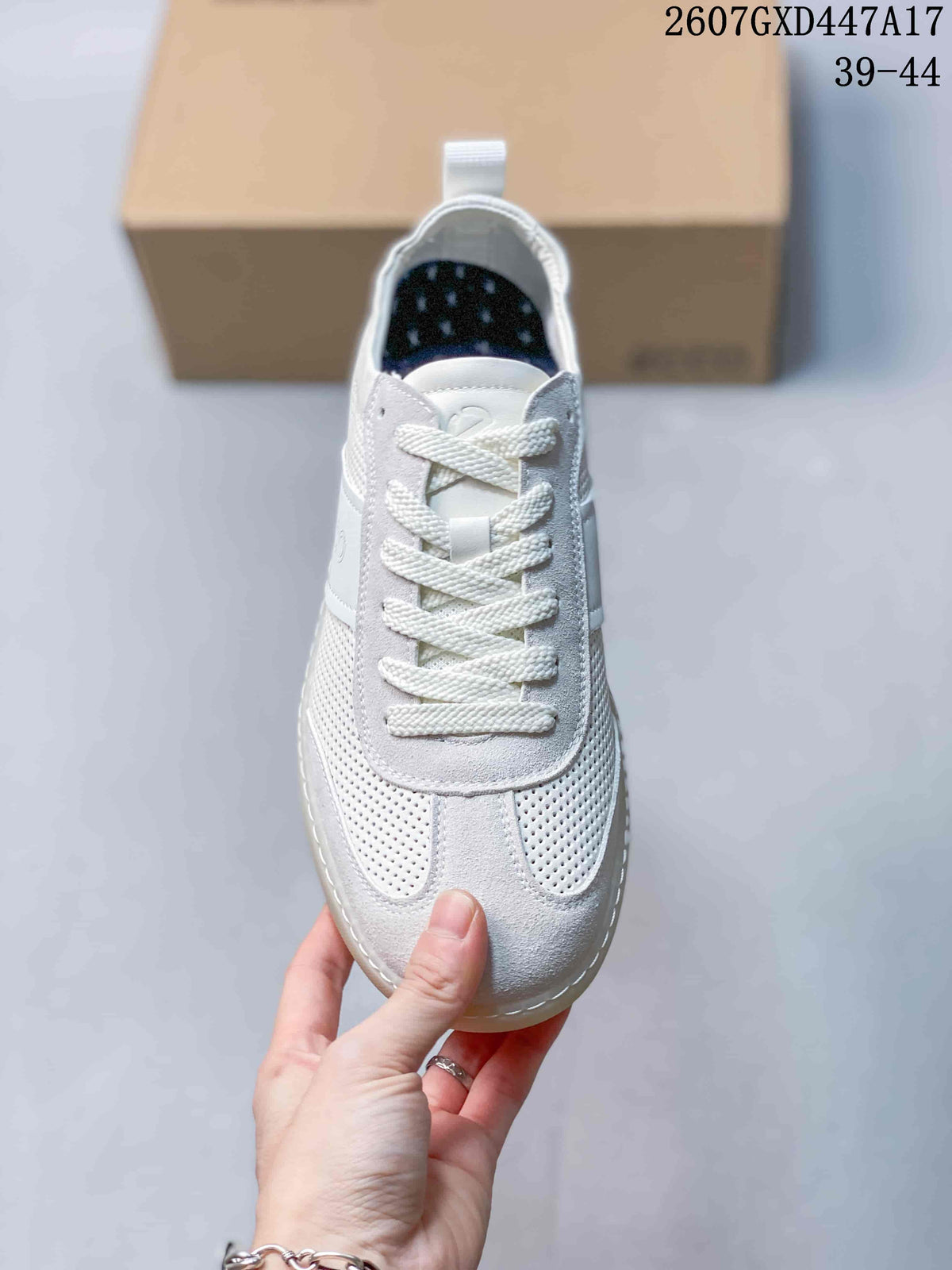 Top view showing the white lace-up construction, perforated forefoot panels and padded tongue.