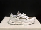 Side profile of a white and grey sneaker with visible Off-White branding on the midsole detail.