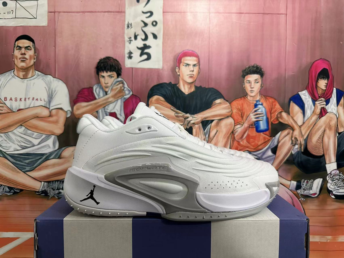 Side view of white basketball shoe showing sculpted panels and ISOPLATE marking