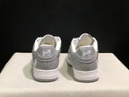 Rear view of the pair showing padded collars, heel branding and grey-white color blocking.