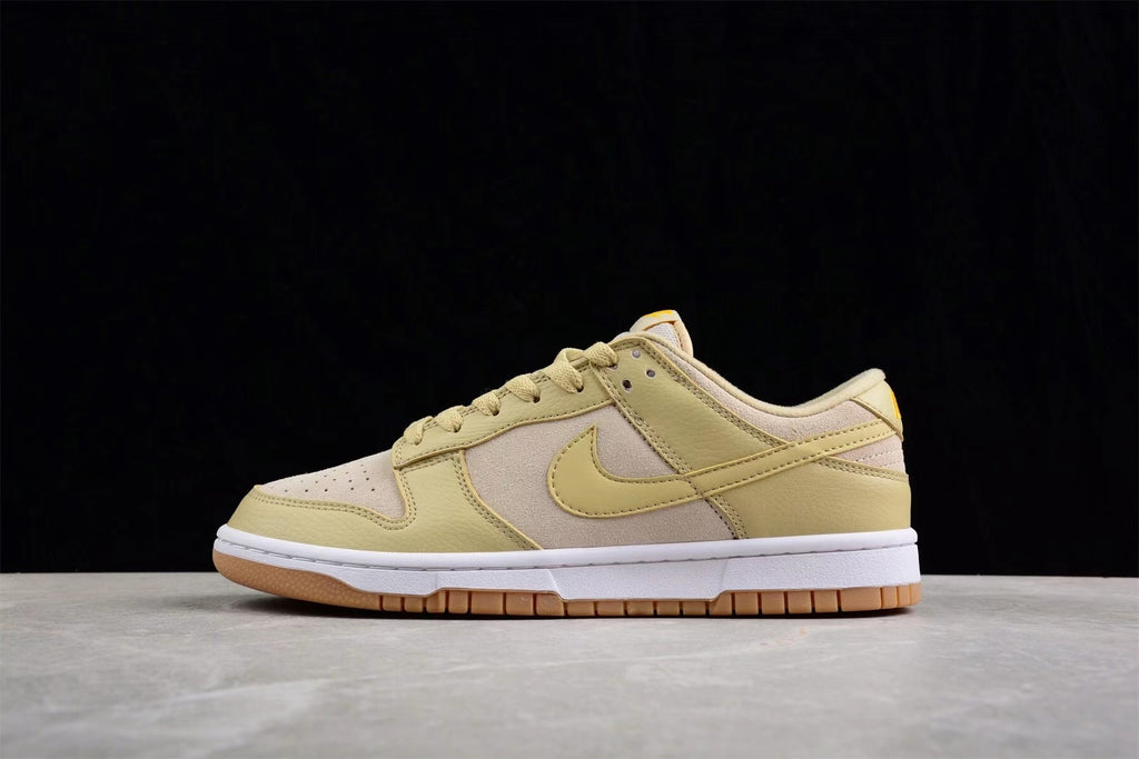 Opposite side profile showing the low-top silhouette and layered sesame and beige panels