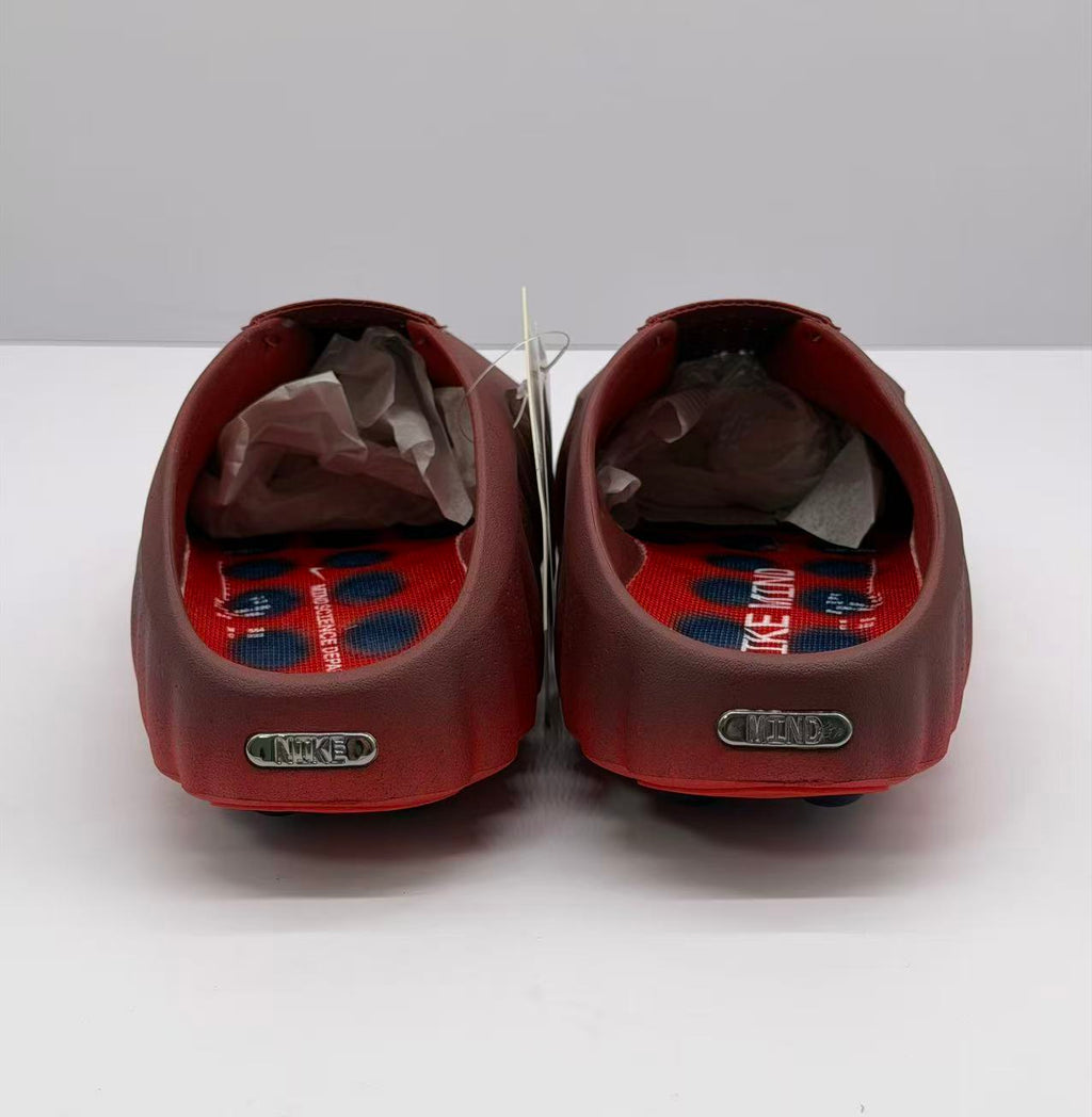 Rear view of the pair showing the heel plaques and red-and-blue patterned insoles.
