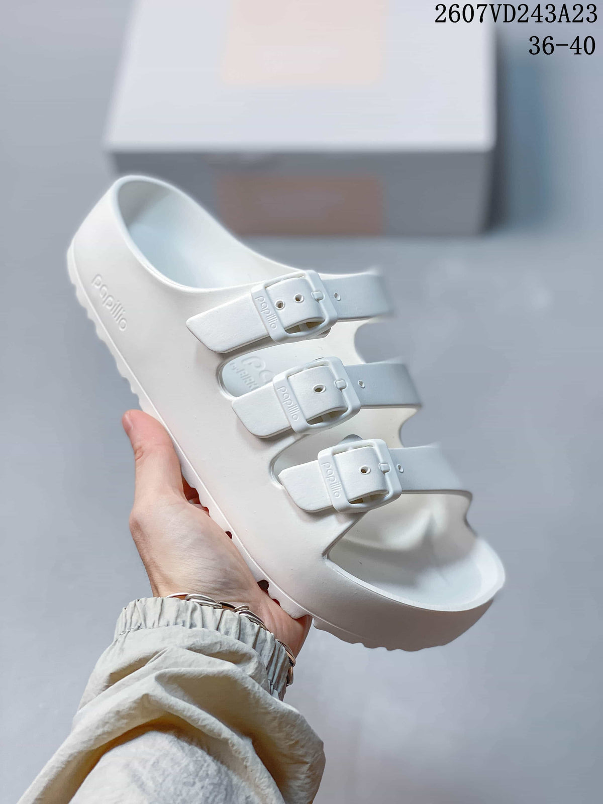White Papillio three-strap sandal shown from an angled front view.
