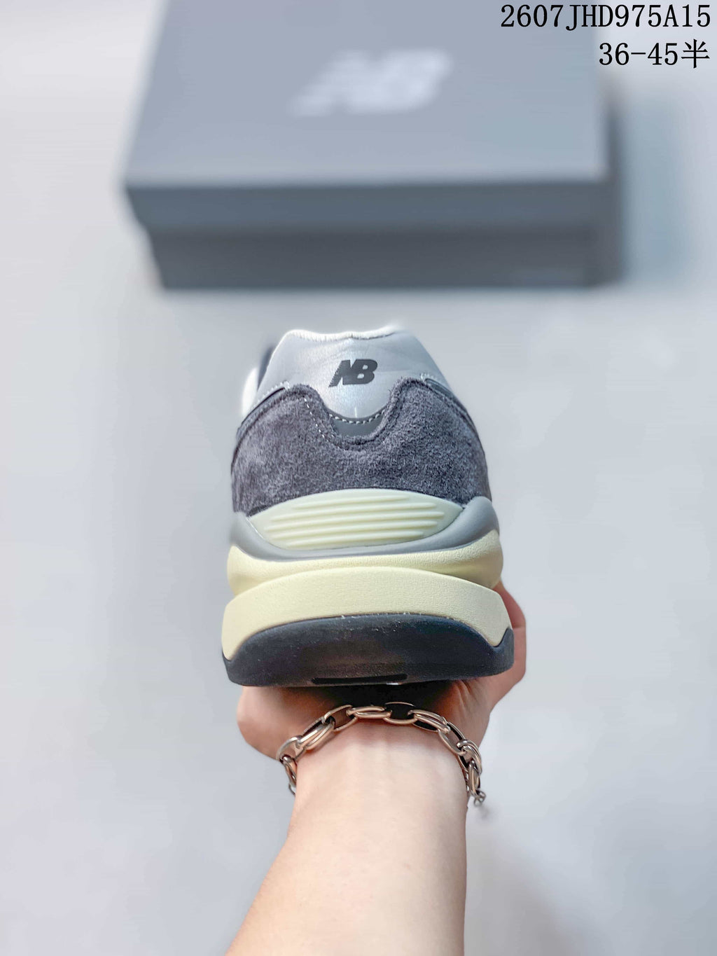 Rear view of the New Balance 5740 sneaker showing the padded heel and layered sole.