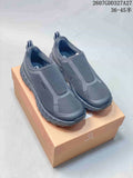 Pair of dark charcoal NORDA slip-on hiking sneakers displayed on a branded shoebox; overlay text shows style code 2607GDD327A27 and sizes 36–45.