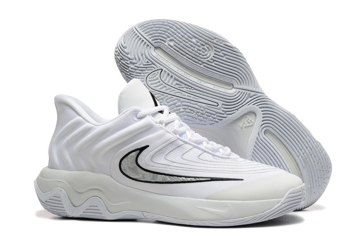 White basketball shoe with black side detail and patterned outsole.